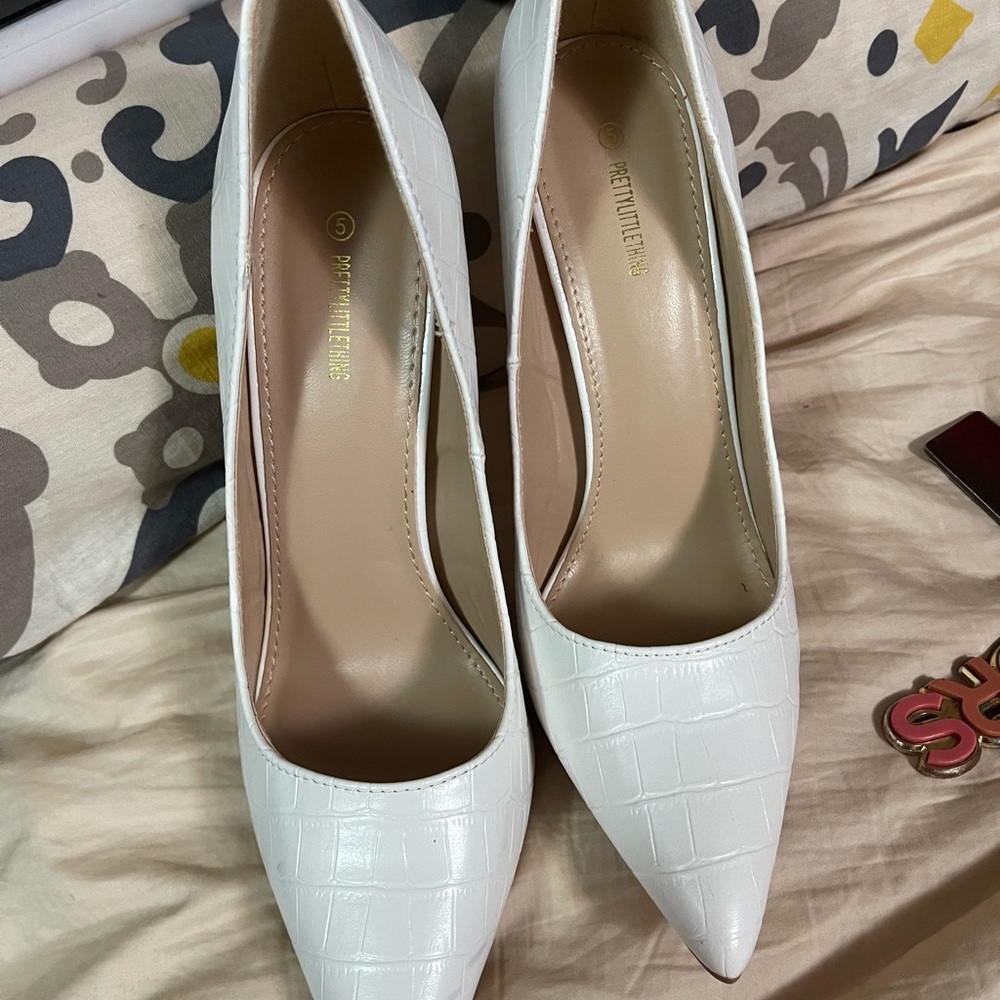 Brand new w/o tags pretty little thing white leather heels. Tried on never used